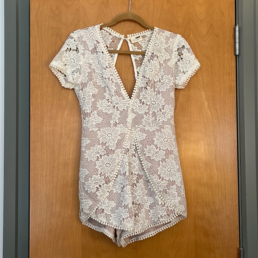 White lace romper with open back